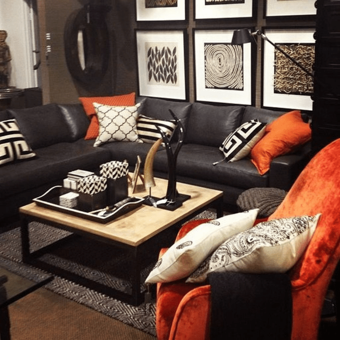 How to decorate room with black sofa